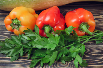 Fresh farmers garden vegetables on wooden table