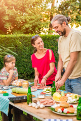 Happy family on barbecue