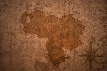 Printed kitchen splashbacks Old dirty textured wall venezuela map on a old vintage crack paper background