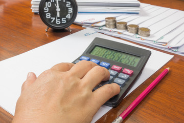 Business calculator pencil reports arranged and document place w