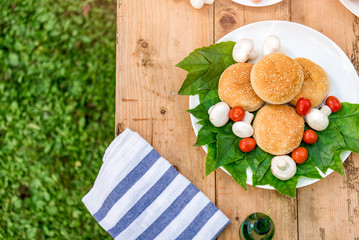 Table with food and drink ready for barbecue party