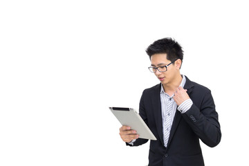 Portrait of a smart asian confident businessman holding tablet