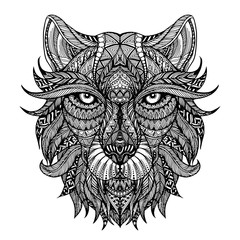 Ethnic patterned ornate hand drawn head of wolf. Black and white