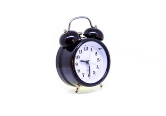 Black alarm clock isolated on white background.