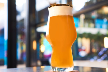 cold glass of beer in pub