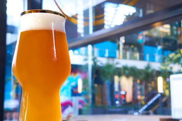 cold glass of beer in pub