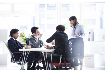 Young business people are meeting in a stylish office
