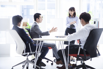 Business people are meeting in a bright office