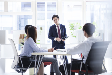 Business people are meeting in a bright office
