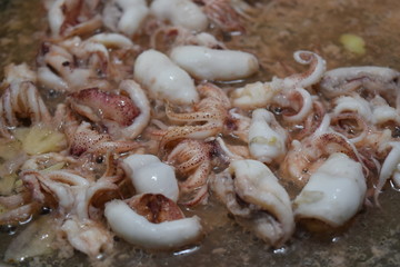 fried fresh squid in saucepan