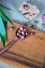Above of Dried Roses in Wooden Spoon