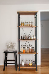 Industrial -rustic shelving unit with glass jars with dry food