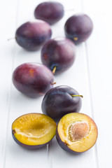 Halved ripe plum.