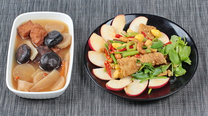 Chinese Vegetable festival  food as fried ginkgo with mixed vegetables served with streamed Chinese medicine herb soup ,  