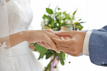 Bride and groom hands, closeup