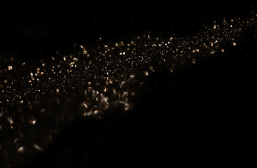 glitter vintage lights background. de focused