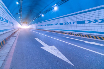 Abstract speed motion in urban highway road tunnel, blurred moti