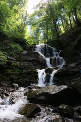 Naklejka premium Waterfall in the mountains of Western Ukraine
