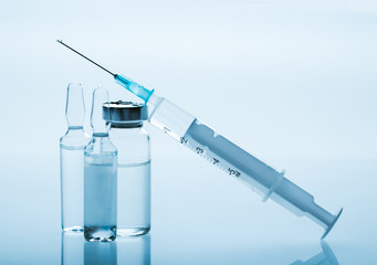 medicament in a glass vial and syringe