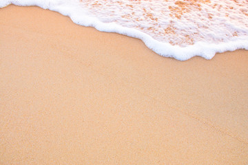 Fototapeta na wymiar moving wave on sand, orange color tone