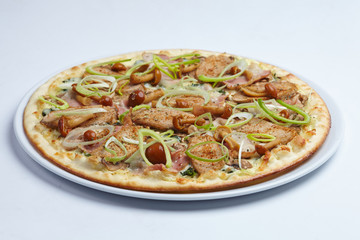 pizza with meat and mushrooms