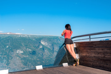 Woman enjoying scenics from Stegastein Viewpoint