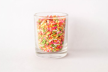 colorful sprinkles in  glass