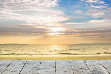 Fototapeta na wymiar Empty perspective wood over blurred beach background