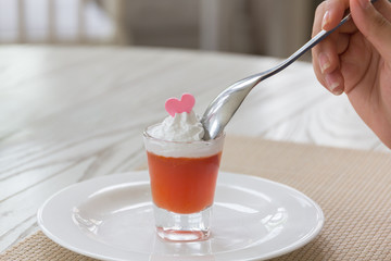 Luxury afternoon tea with dessert on wooden table.