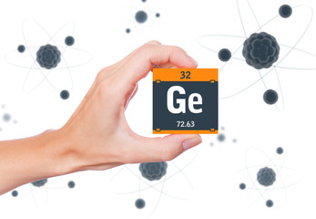 Germanium element symbol handheld and atoms floating in background