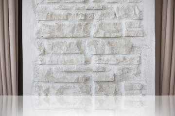 Stone block wall background with curtain.