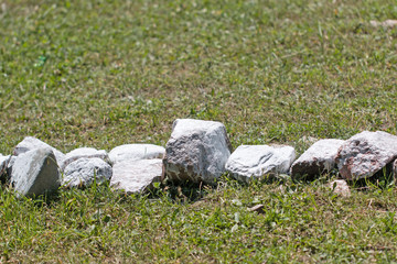 different stones on the grass