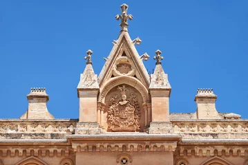 Foto op Aluminium Decorative wimperg above the portal to the Bishop's Palace in Md © Serg Zastavkin