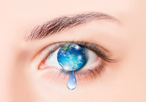 Planet earth in eye isolated - "Elements of this image furnished by NASA"