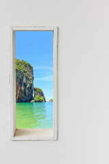 White wood wall window with sea beach view.