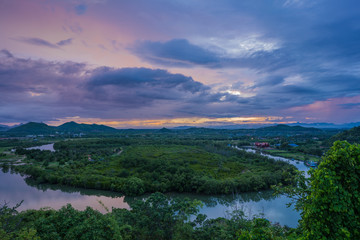 Obraz premium Scenery in twilight on the hill where located Chao Mae Tubtim Thong Shrine above Pranburi river , Pran Buri District, Prachuap Khiri Khan , Thailand