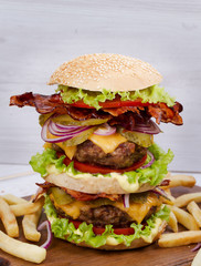 Burger With Beef, Bacon, Tomato, Cheese, Lettuce and Onion