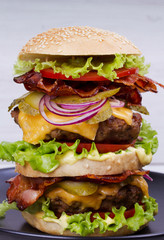 Burger With Beef, Bacon, Tomato, Cheese, Lettuce and Onion