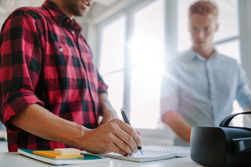 Young developers working together in office