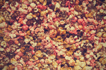 Sweet colorful popcorn in vintage style. Street food
