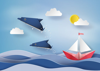 Naklejka premium Origami made dolphin and sailing boat Float on sea .