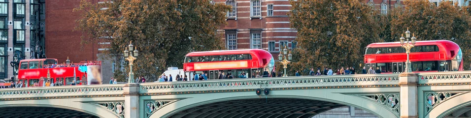 Foto op Plexiglas Three red buses crossing Westminster Bridge, London - UK © jovannig