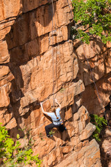 Climbing  Woman rock cliffs 