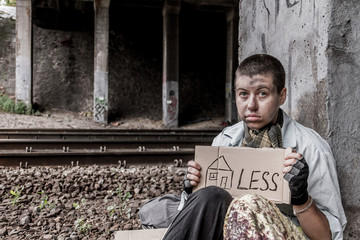 Fototapeta na wymiar Desperate homeless woman