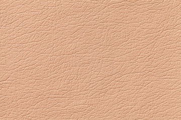 Light orange leather texture background with pattern, closeup