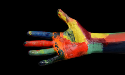 Multi Colors Oil Painted Hand Fist close up on black background