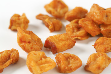 Fried pieces of pork rind and fat