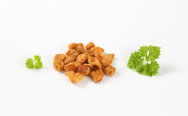 Fried pieces of pork rind and fat