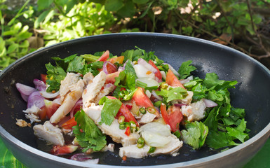 spicy chicken salad in Thai restaurant