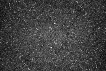 Asphalt background texture with some fine grain in it background